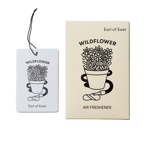 Earl of East Home & Car Card Air Freshener in Wildflower scent, with a floral blend of jasmine, gardenia, and rose geranium for a fresh and fragrant aroma.